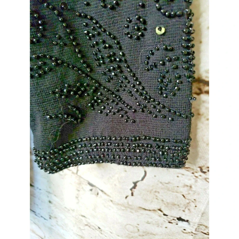 Woman's Theomiles  Black sweater with beaded sleeves sz M